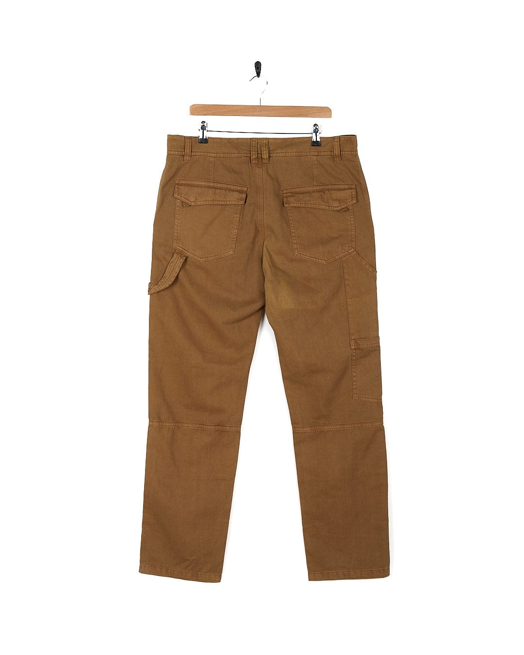 A pair of Saltrock Oslo - Mens Carpenter Trousers - Brown hanging on a hanger with detailed stitching.