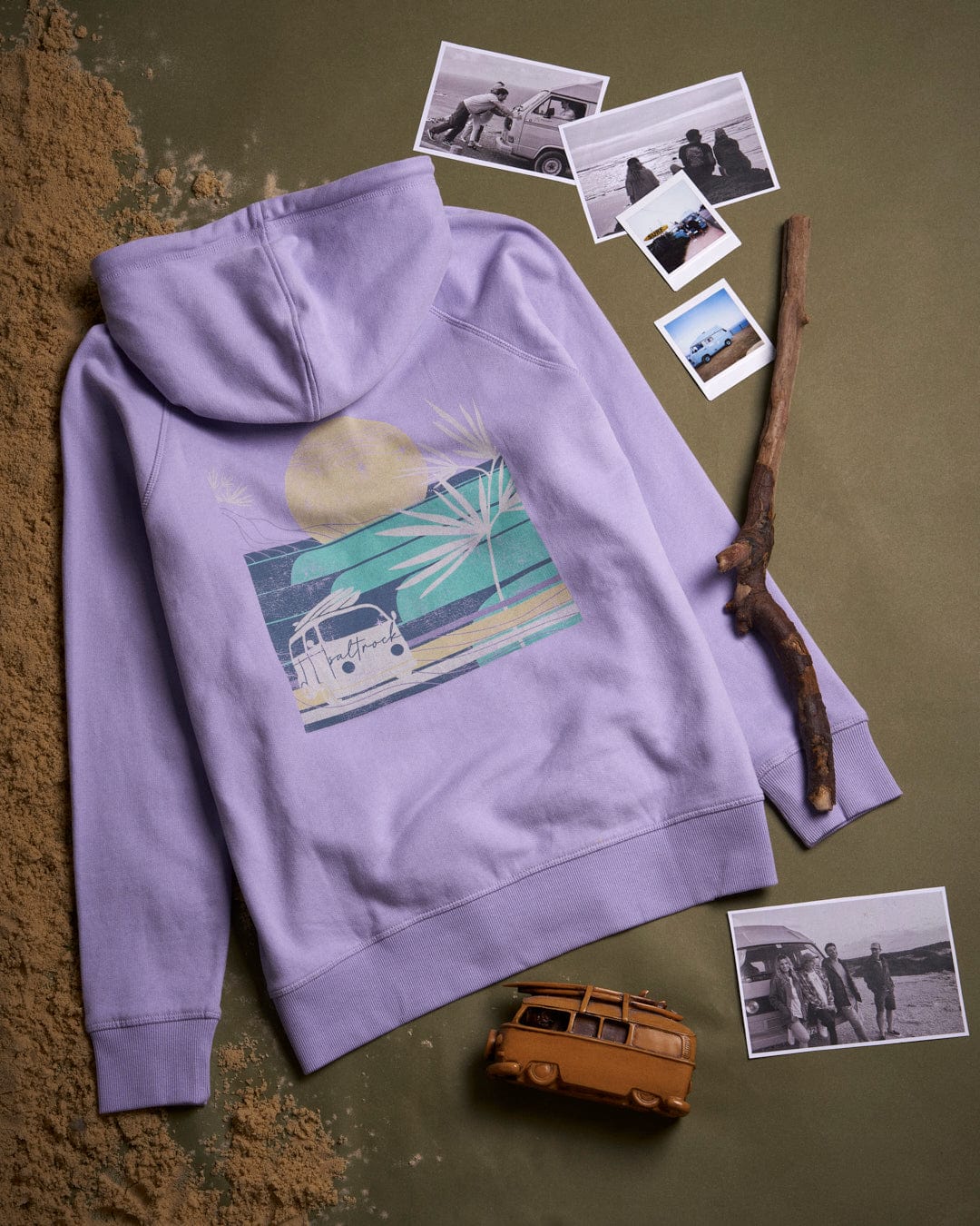 A Lilac womens zip hoodie from Saltrock with a picture of camper van and sunset on it made of peached soft cotton.