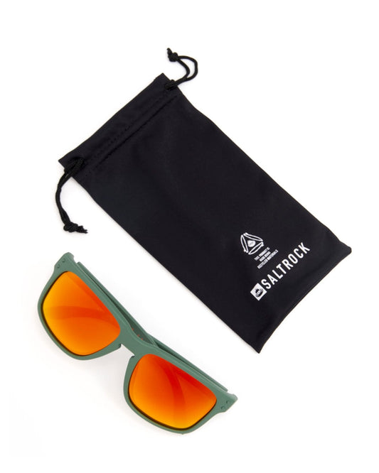 A pair of Ranger - Recycled Polarised Sunglasses - Green with orange lenses and a black pouch for UV400 protection by Saltrock.