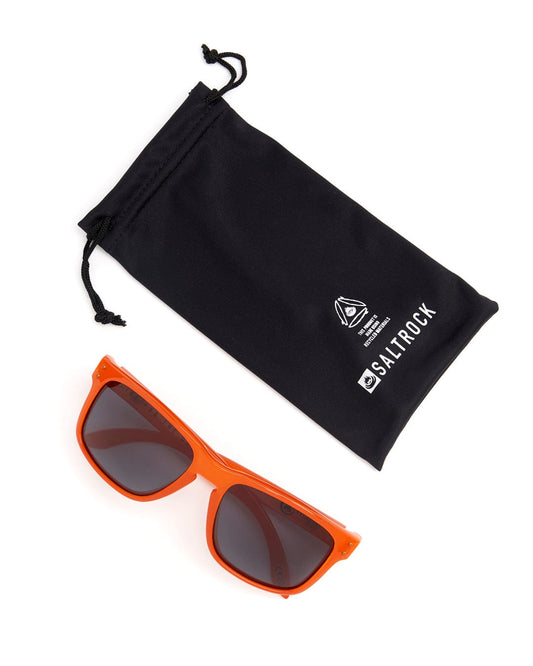 A pair of Ranger - Recycled Polarised Sunglasses in Orange by Saltrock with a black pouch.