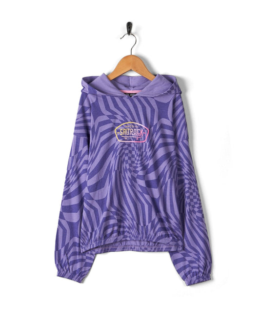 A purple and black striped Saltrock lightweight pop hoodie with a "sherlock" logo, hanging on a wall-mounted coat hanger against a white background.