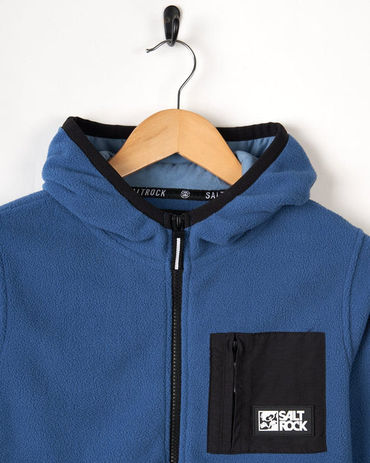 A Saltrock Re-Issue - Kids Fleece - Blue hoodie with a black patch on it.