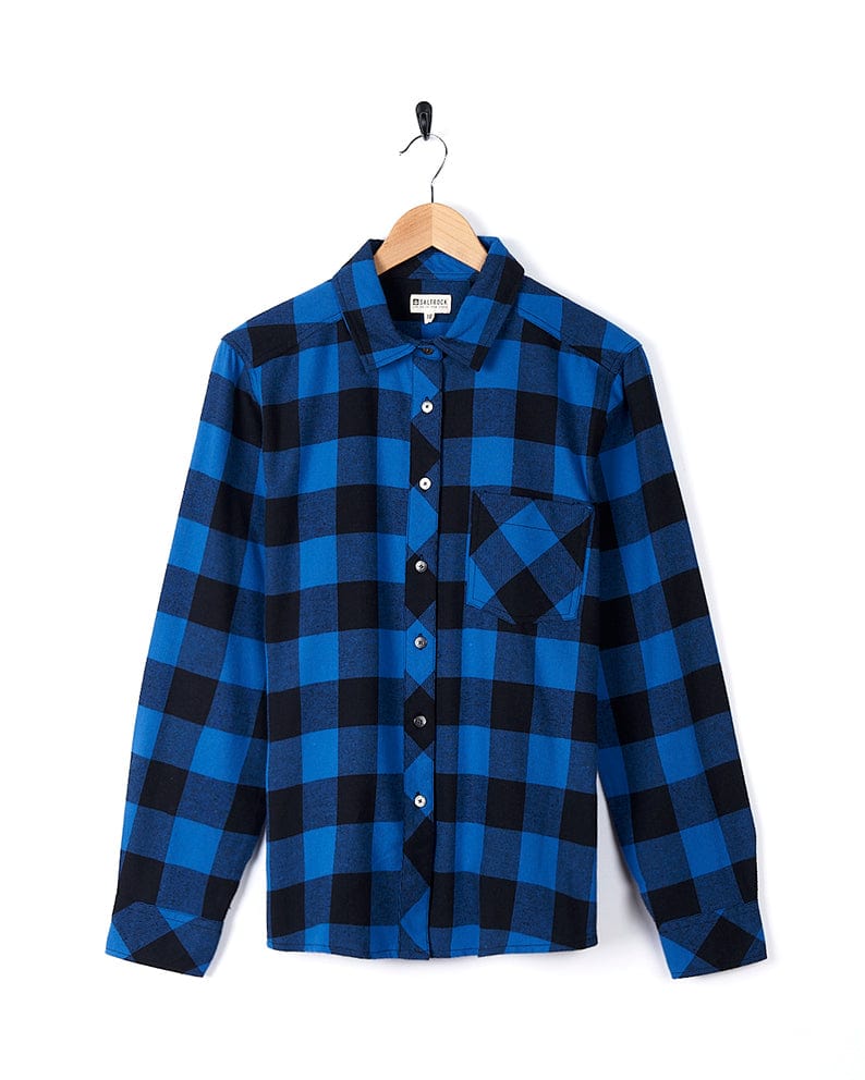 A Rosalin - Womens Check Shirt - Blue/Black by Saltrock hanging on a hanger.