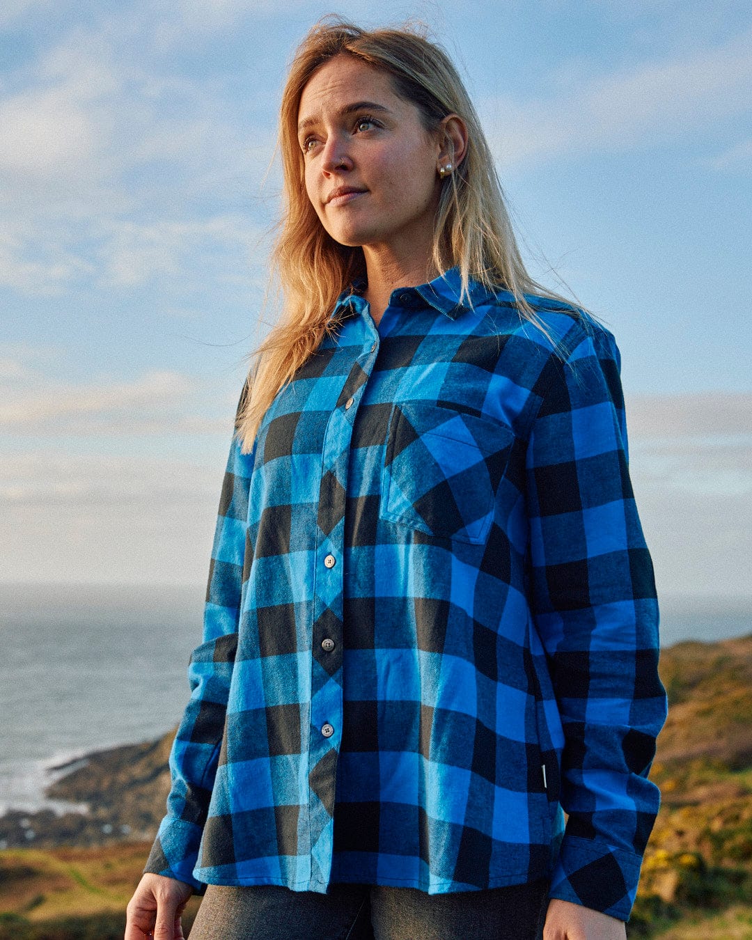 Saltrock Rosalin - Womens Check Shirt - Blue/Black, a woman wearing a blue and black plaid shirt made of cotton in a check pattern.