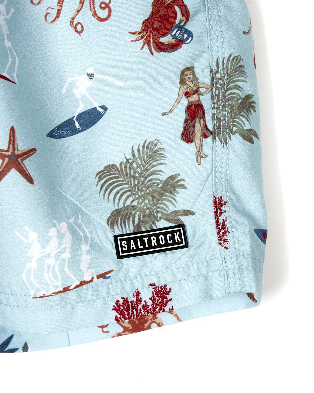 A Saltrock - Ruan - Mens Swimshorts - Light Blue with a hawaiian theme.