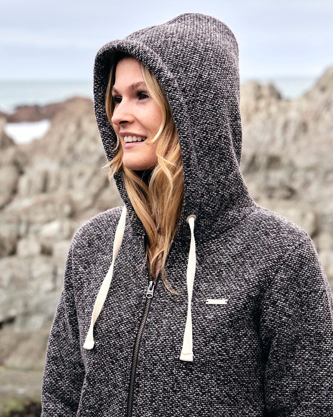 Saltrock Sofie - Womens Borg Lined Zip Hoodie - Brown, a cozy choice for a woman on the beach.