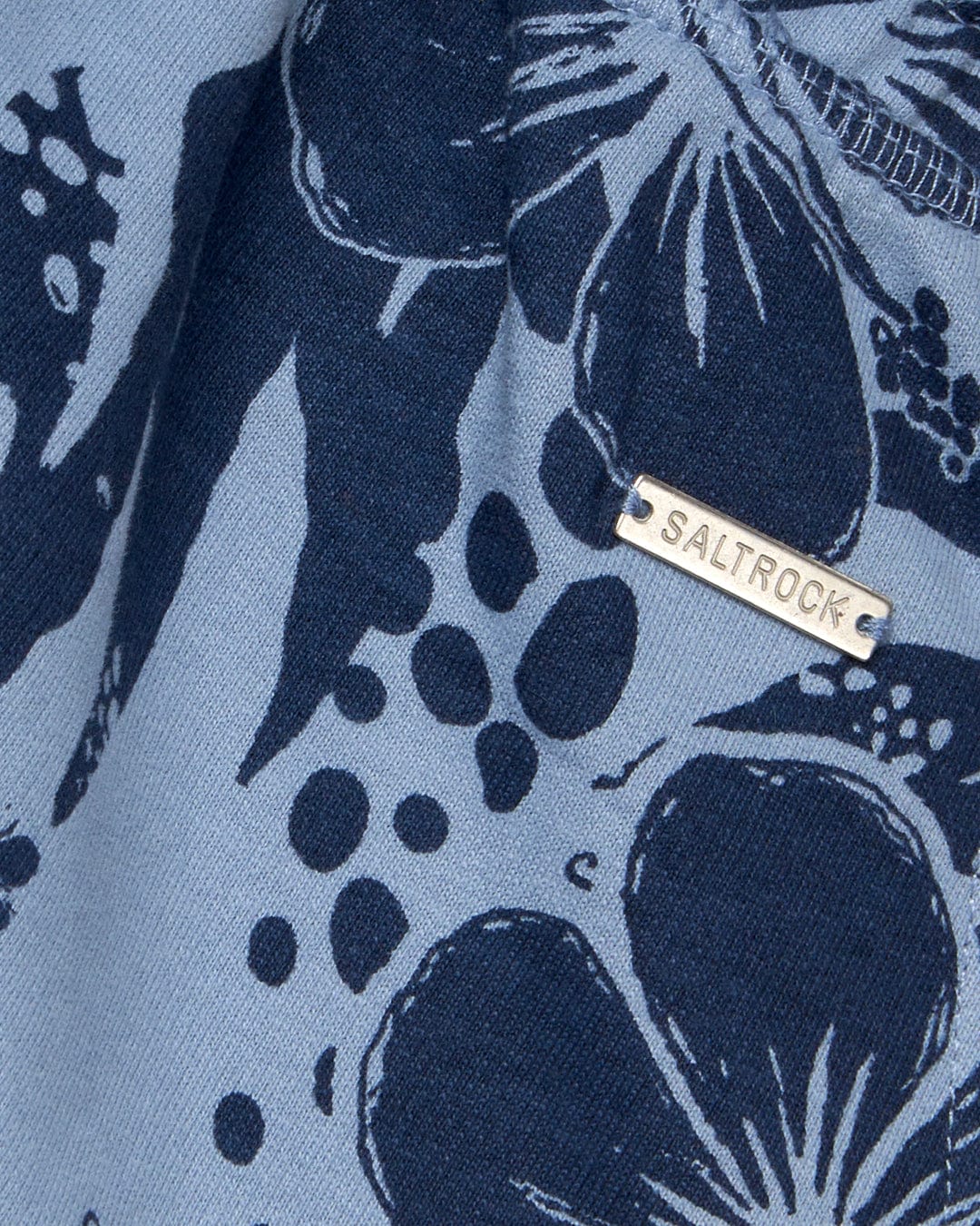 A blue and white Saltrock Soifra Hibiscus Womens Sweat Short with a hibiscus flower on it.