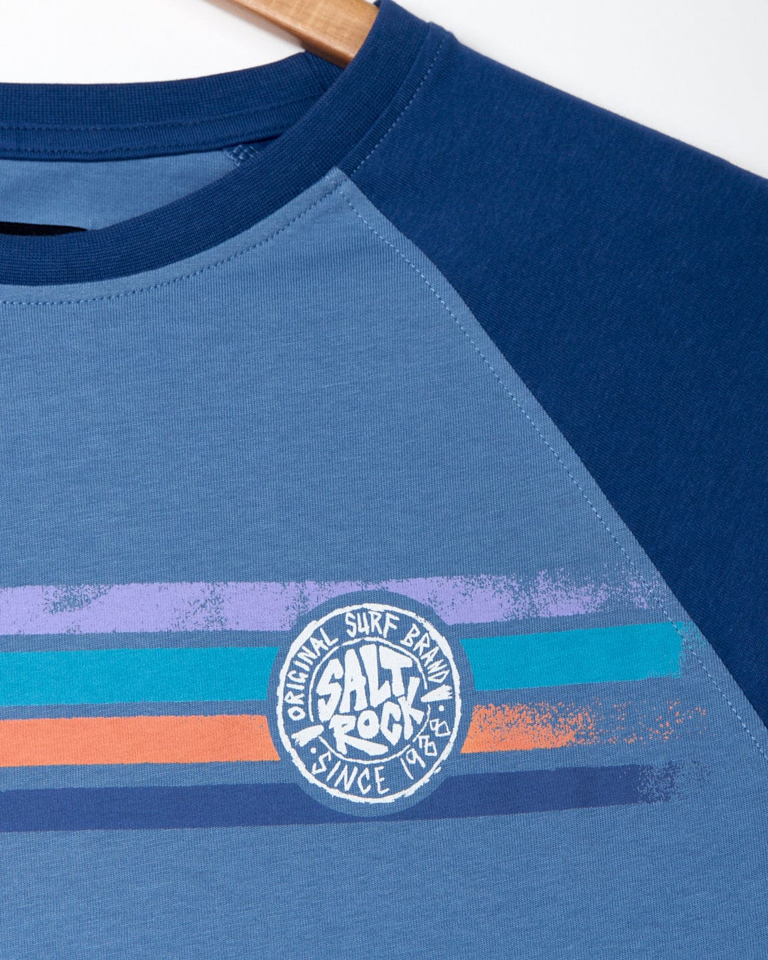 A Saltrock blue cotton Spray Stripe - Mens Long Sleeve T-Shirt with an orange and blue stripe.