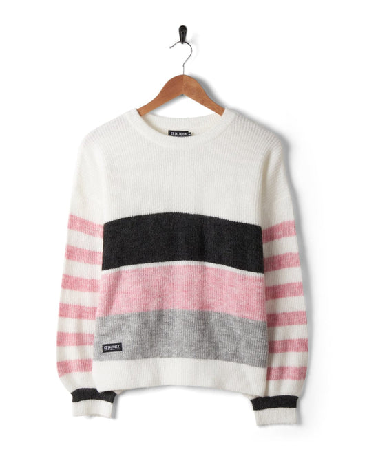 A Saltrock Darcy striped sweater with soft touch fabric, hanging on a hanger.
