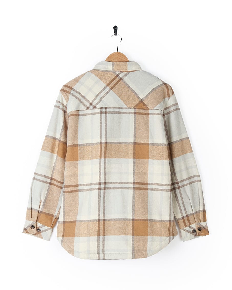 A white and tan plaid Saltrock Stella - Womens Checked Borg Lined Shacket - Cream hanging on a hanger.