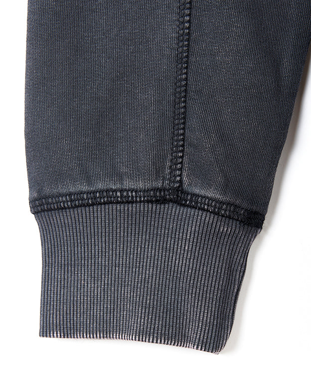 A close up of a pair of Saltrock Stellan - Mens 1/4 Neck Sweat - Grey Acid Wash sweatpants.