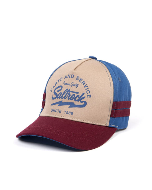 A Strike cap in Blue/Burgundy with the words "life" and "service" on it, featuring an adjustable strap for a custom fit by Saltrock.