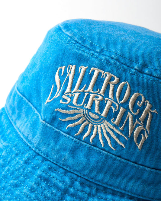 Blue Sunburst Bucket Hat with "Saltrock surfing" embroidered in white thread.