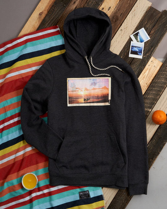 A machine washable, black hoodie with a beach scene graphic of a sunset on it.
Product Name: Sun Sets - Mens Pop Hoodie - Charcoal
Brand Name: Saltrock
