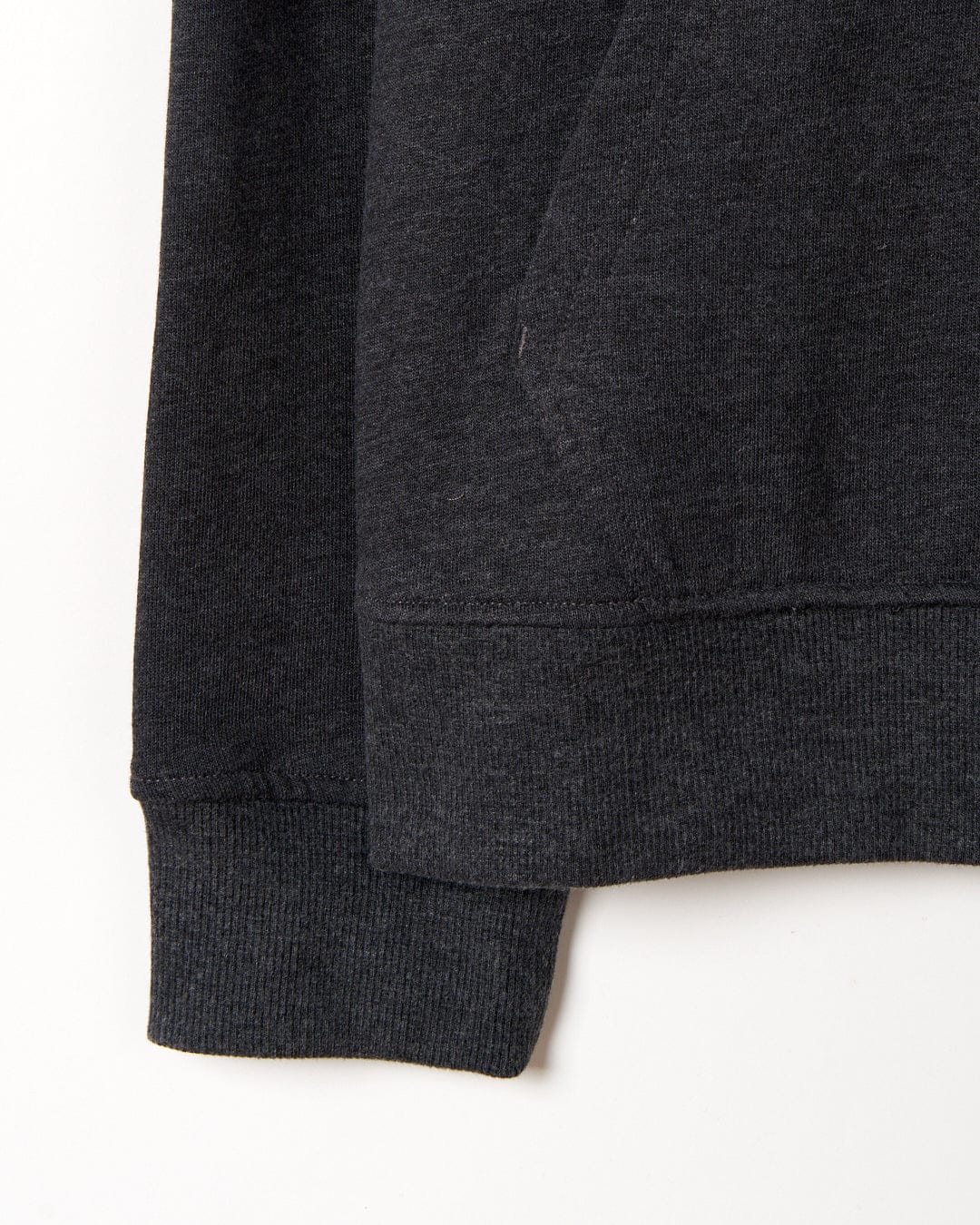 A close up of a Saltrock Sun Sets - Mens Pop Hoodie in Charcoal with striped draw cords.