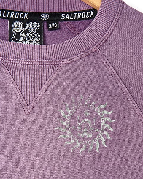 A Saltrock purple sweatshirt with the Til Dawn - Kids Sweat - Purple product name and a sun on it.
