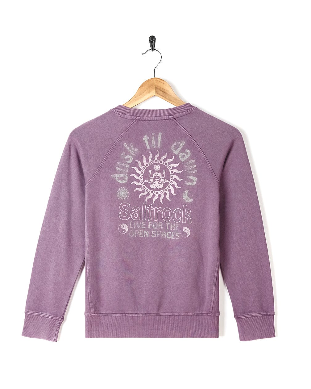A comfortable Til Dawn - Kids Sweat - Purple sweatshirt from Saltrock, with an image of a sun on it.