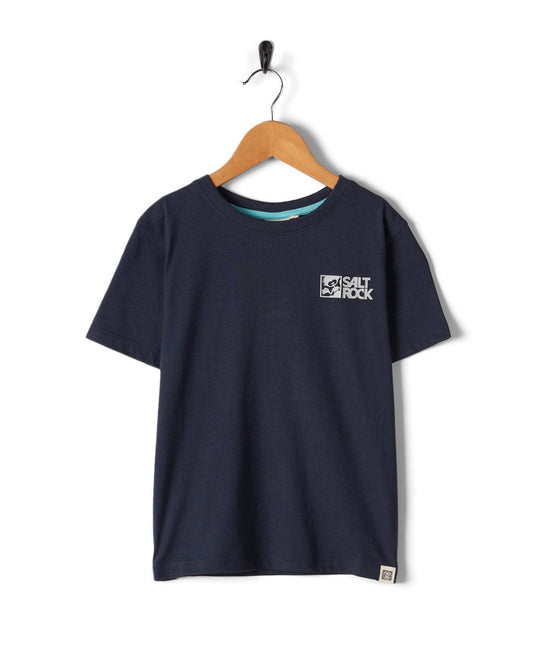 Dark blue basic t-shirt with a light grey collar and a small Saltrock branding logo on the left chest, hanging on a wooden hanger against a white background.