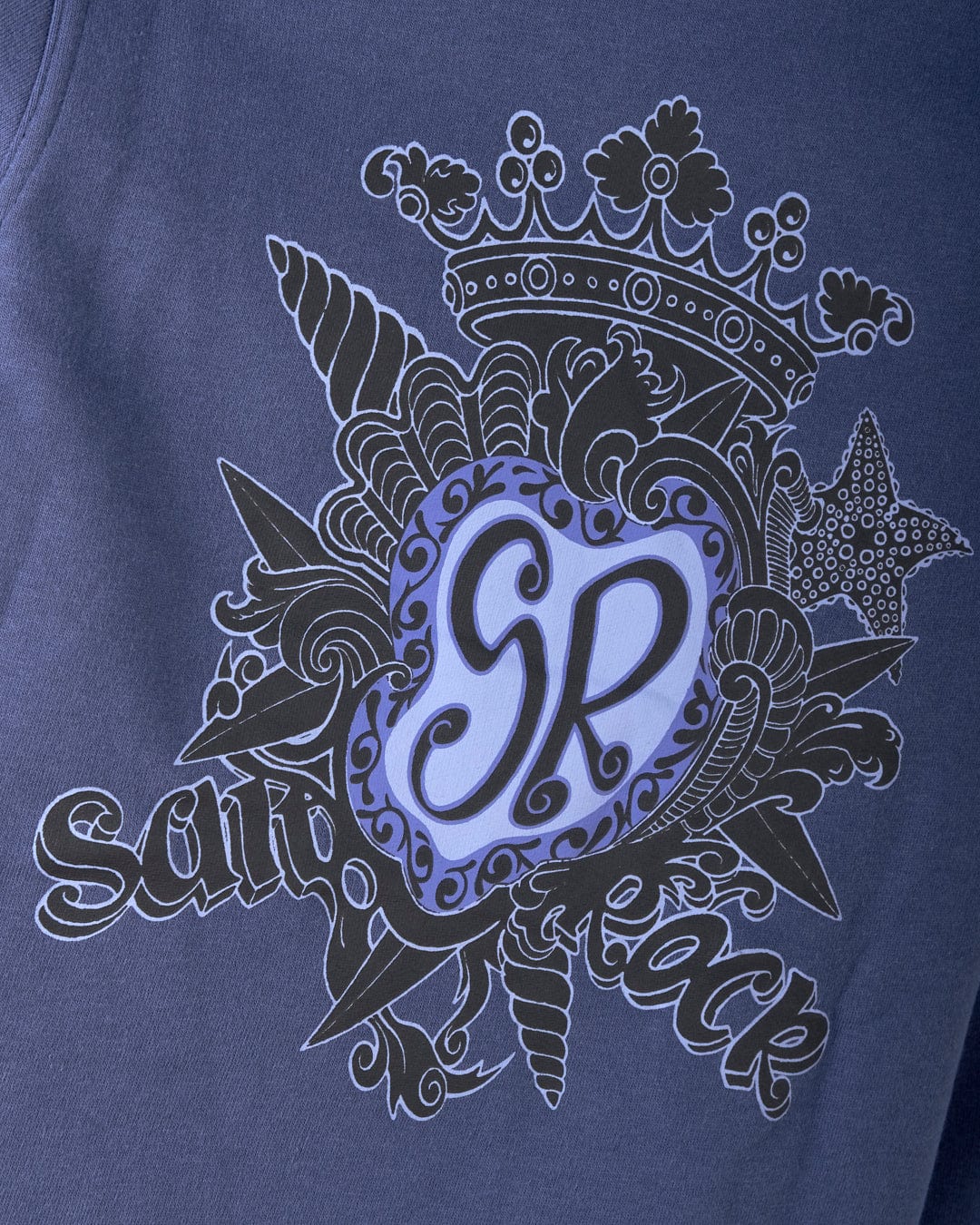 This Tribal SR Kids Recycled Pop Hoodie from Saltrock features a decorative design on blue fabric with "SR" inside a heart, surrounded by a crown, shells, and starfish. Made from recycled materials, it includes a kangaroo pocket for style and convenience.