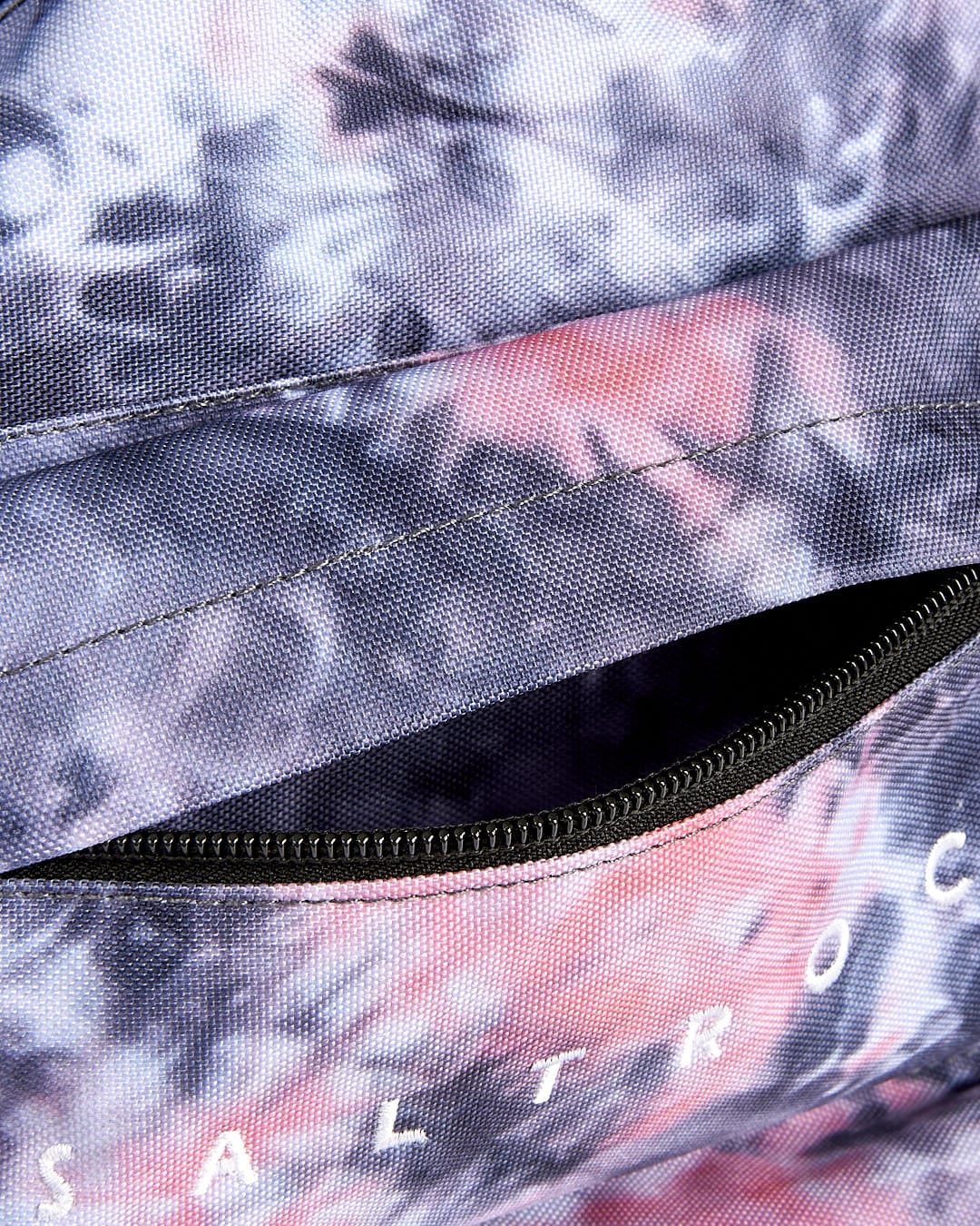 A Uni-Vision - Backpack - Pink with the word Saltrock on it.