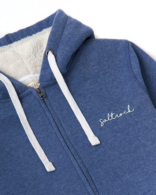 Close-up of a Velator hoodie with a white zipper and "Saltrock" branding embroidered on the chest, featuring a fleece-lined interior.