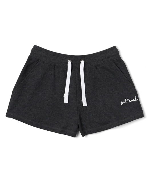 Pair of Velator athletic shorts made of jersey material with white drawstrings and the word "Saltrock" written in cursive on the left leg.