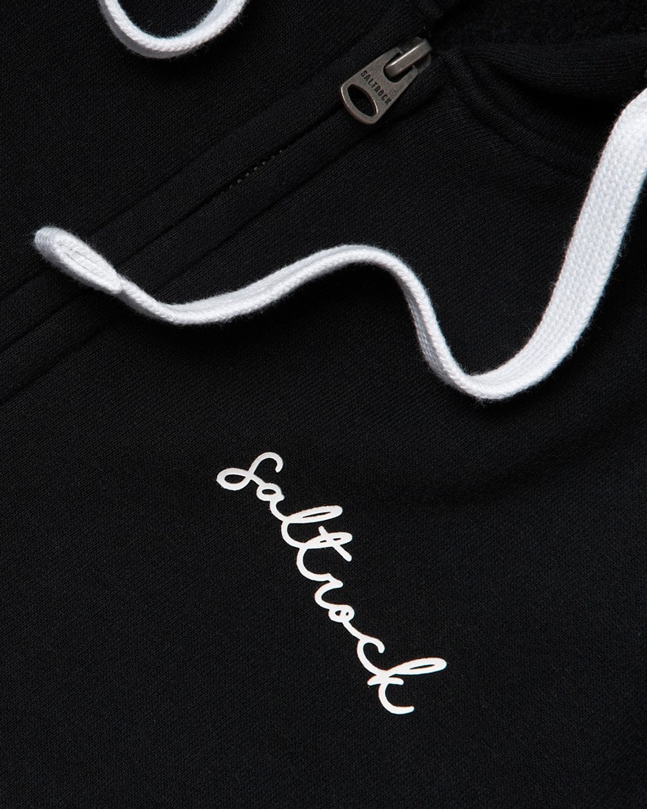 The Saltrock Velator Zip Hoodie is a women's staple wardrobe essential featuring Saltrock branding on a stylish black hoodie with white lettering.
