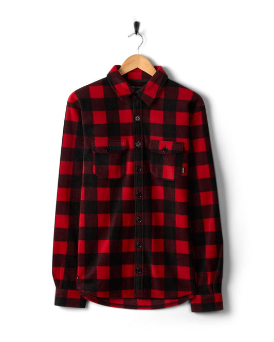 Waldron - Mens Long Sleeve Shirt - Red/black check shirt hanging on a wooden hanger against a white background. (Saltrock)