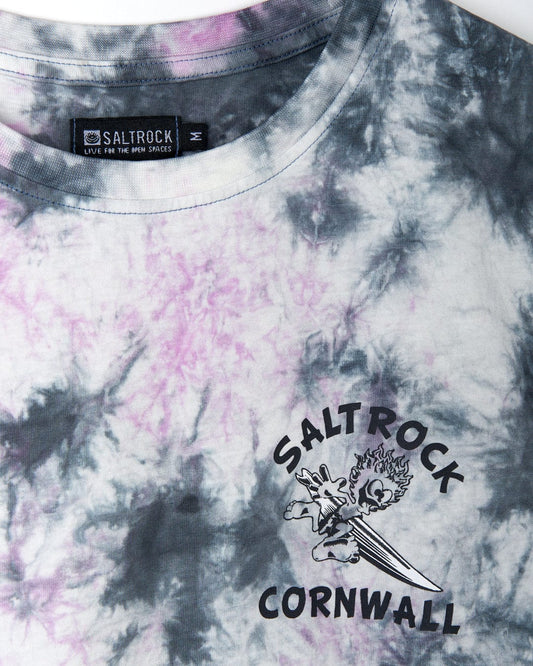 Close-up of a Wave Rider Cornwall - Mens Tie Dye Short Sleeve T-Shirt in Pink Tie Dye with the Saltrock branding.
