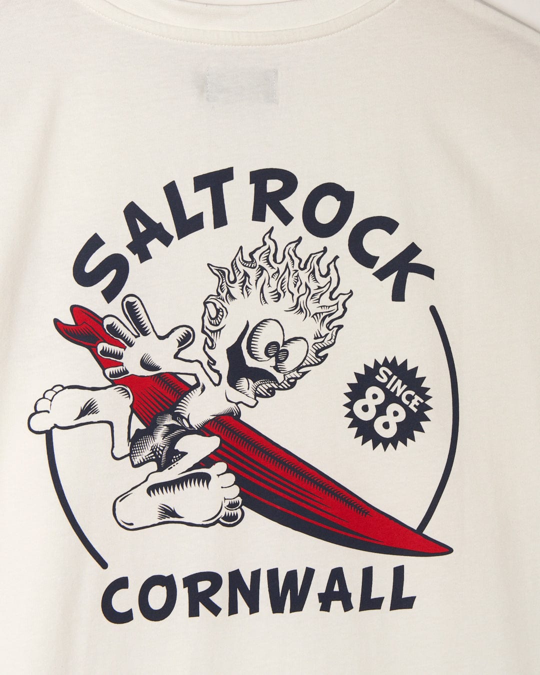 A graphic t-shirt featuring Saltrock branding, made from peached soft material, called the Wave Rider Cornwall - Mens Short Sleeve - White by Saltrock.