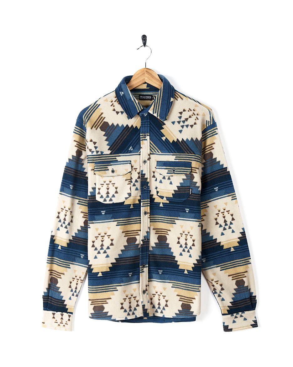 A Saltrock - Mens Aztec Fleece Shirt - Blue on a hanger.