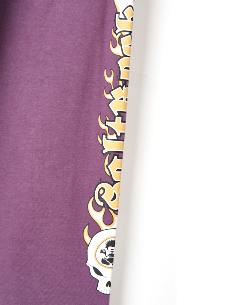 A Saltrock X Boards - Kids Hooded Tee - Blue/Purple with a skull and flames on it.