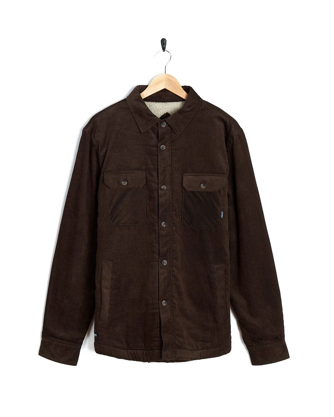 A comfortable Zeke - Mens Cord Borg Lined Shacket - Dark Brown jacket hanging on a hanger.