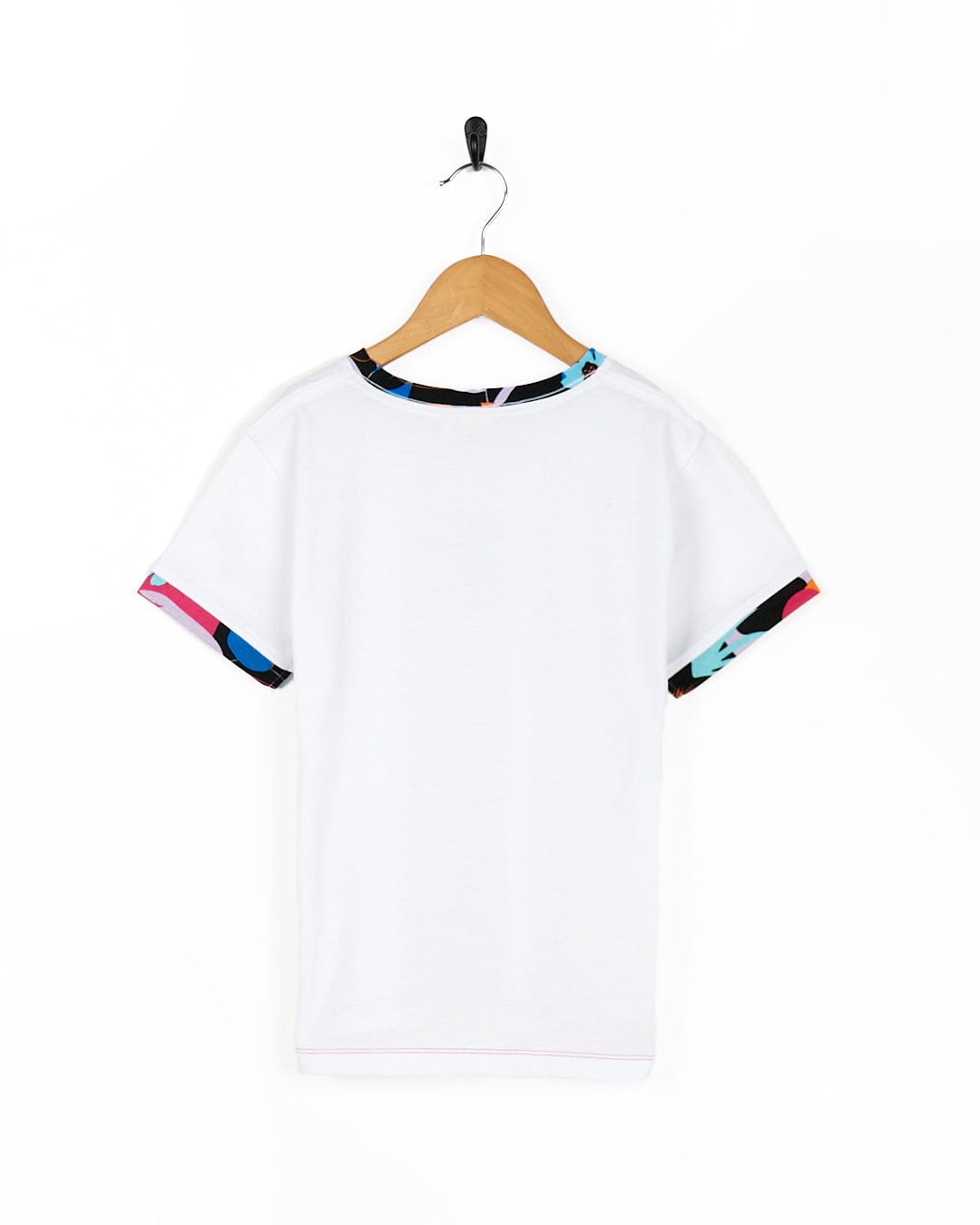 A Zephyr Tok - Kids Ringer Tee - White by Saltrock hanging.