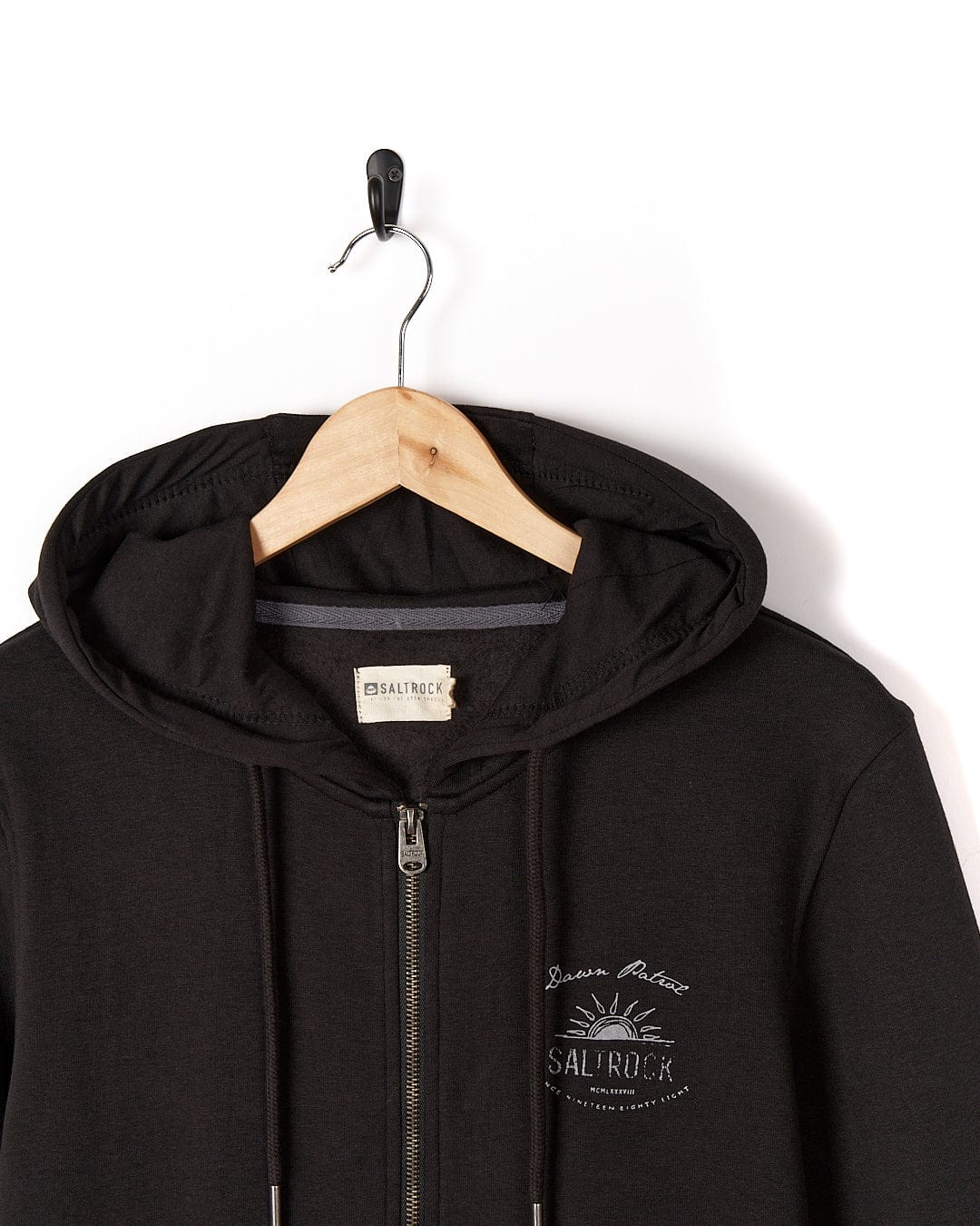 A Saltrock - Mens Zip Hoodie - Black with a logo on it.