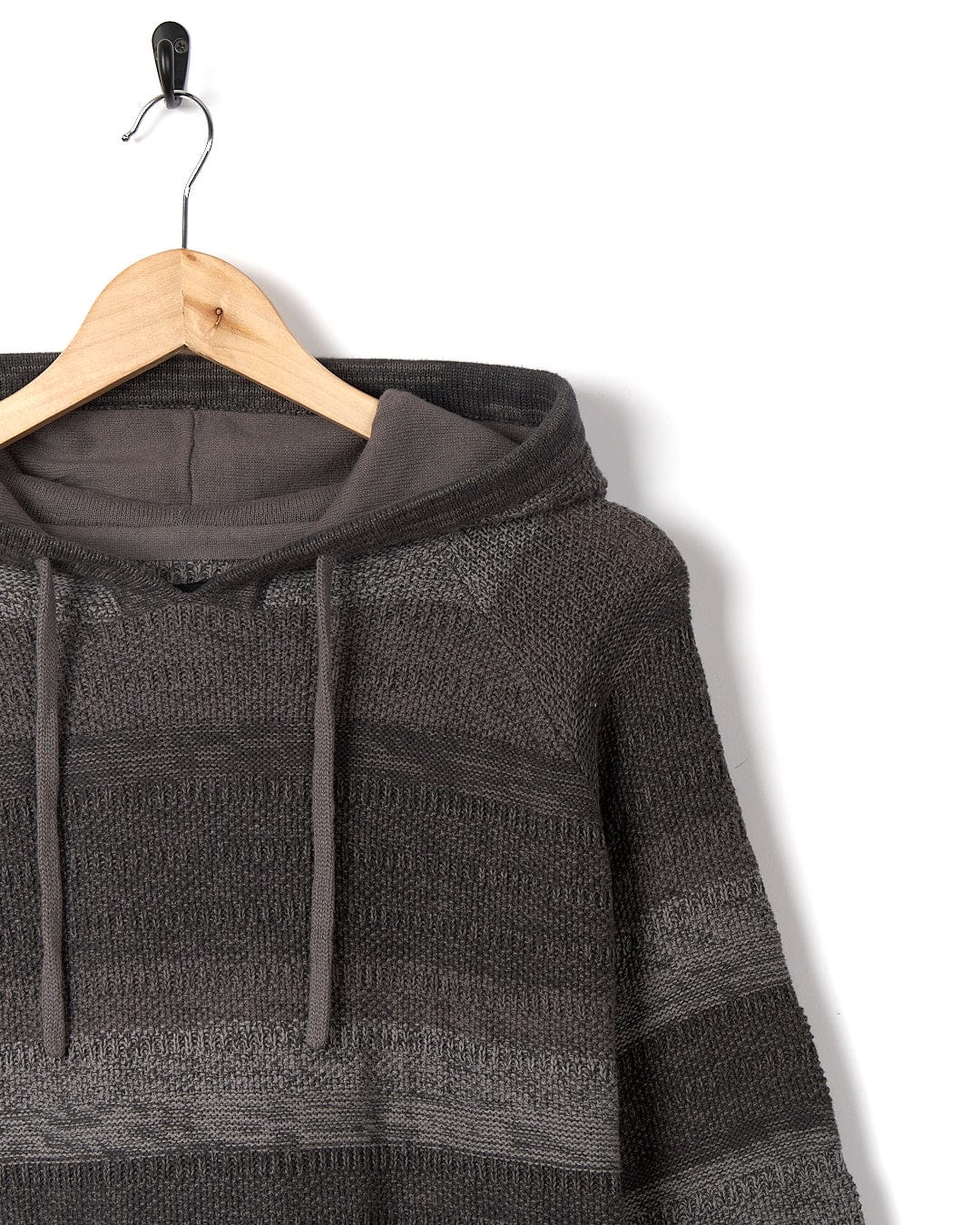 A Saltrock Grohl - Mens Knitted Hoodie - Dark Grey hanging on a hanger.