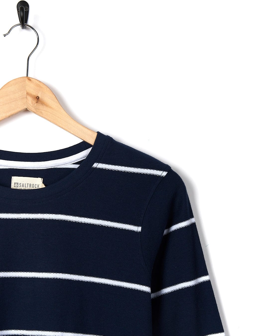 Hartland - Women's Striped Long Sleeve T-Shirt - Blue with Saltrock branding hanging on a wooden hanger against a white background.