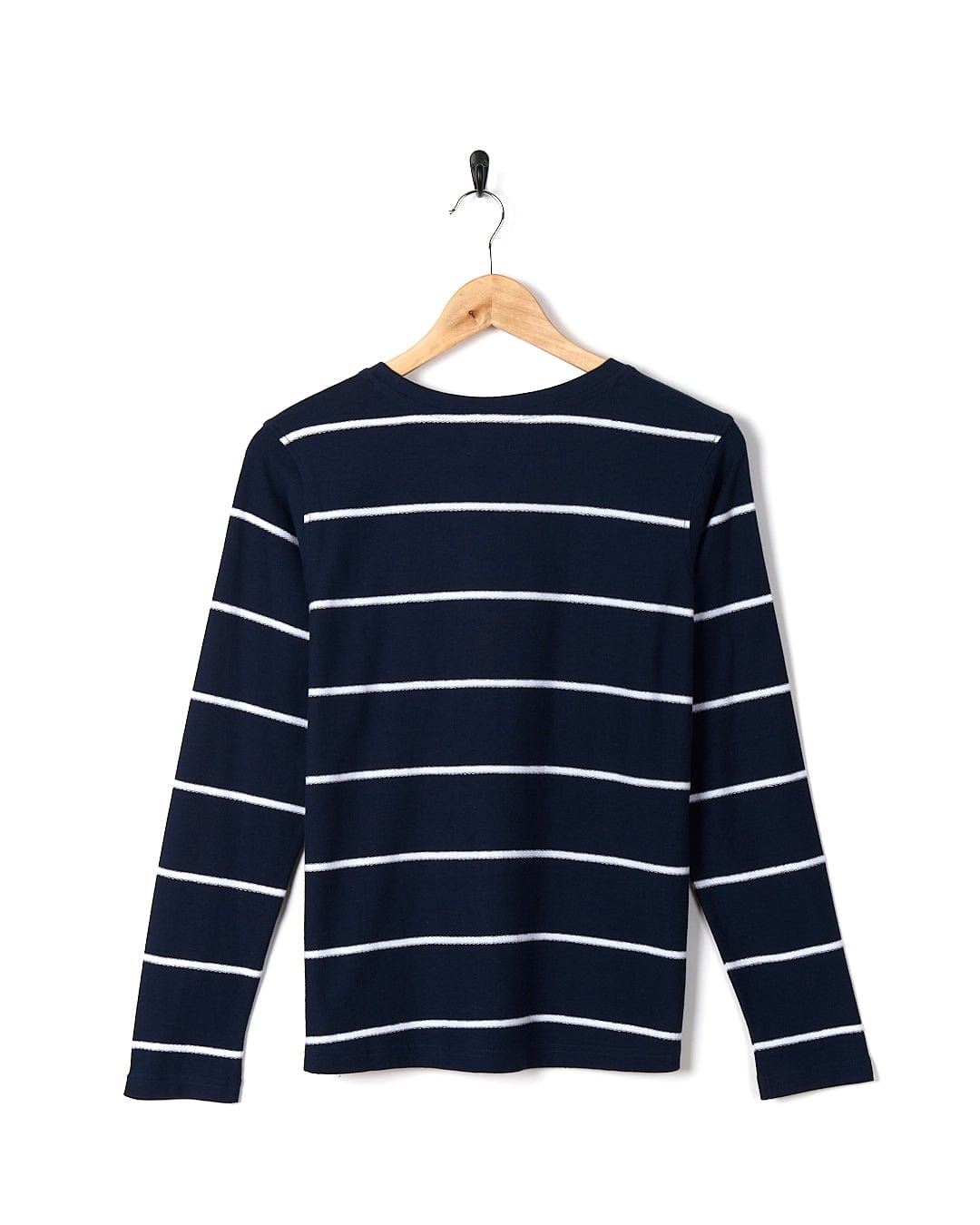 A Saltrock Hartland - Womens Striped Long Sleeve Tee - Blue hanging on a wooden hanger.