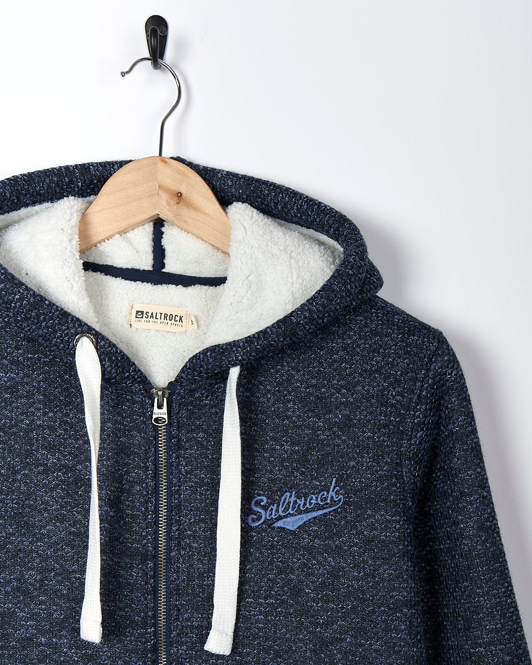 A Saltrock Jazz - Womens Borg Lined Zip Hoodie - Dark Blue with a hood.