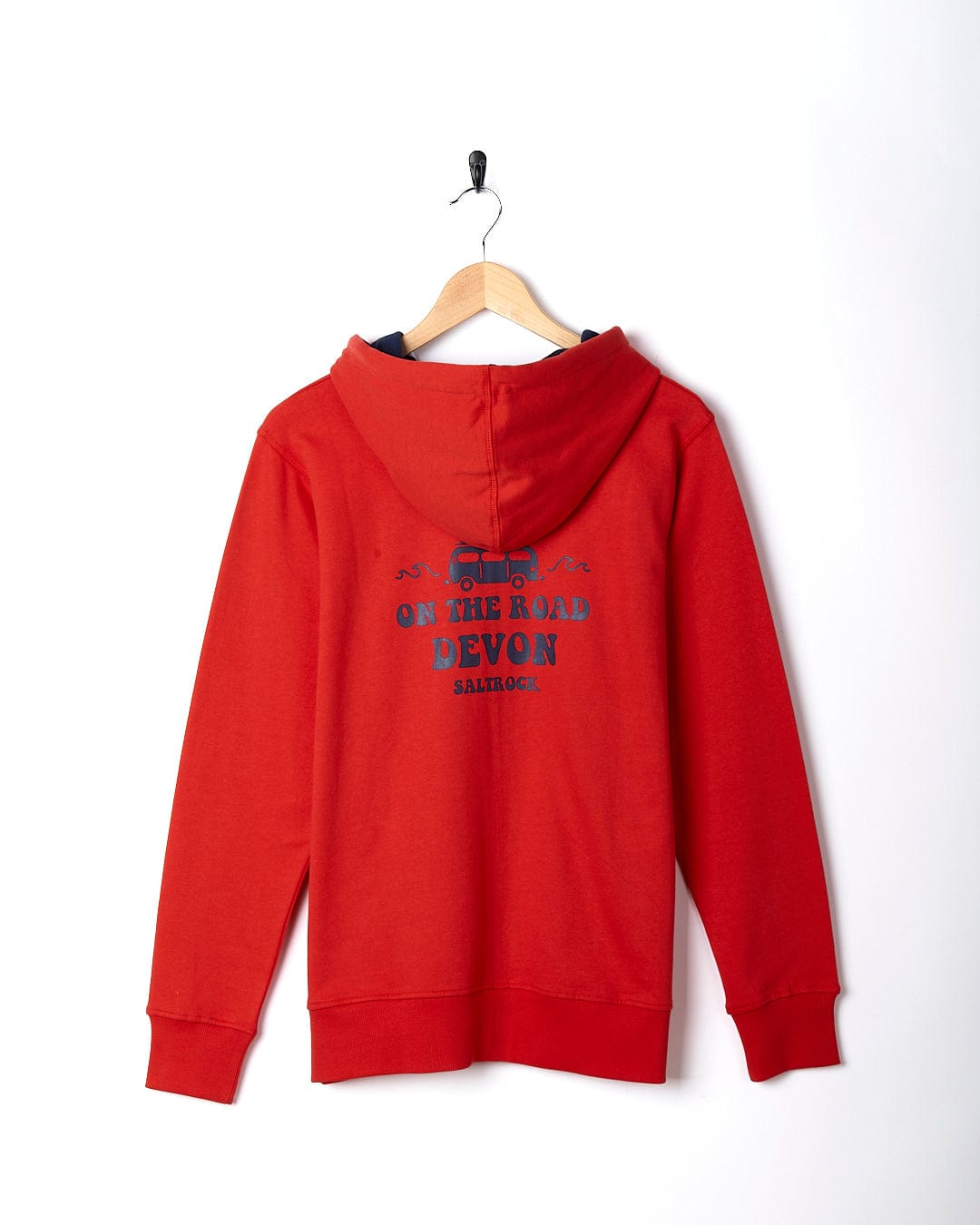 A Saltrock On The Road Devon - Womens Zip Hoodie - Red hanging on a hanger.