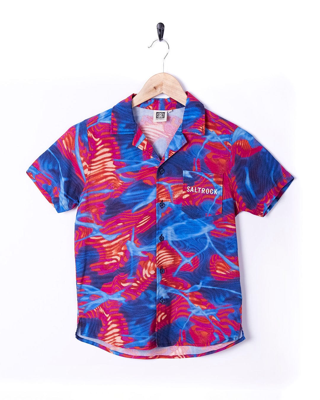 A Saltrock Poolside - Kids All Over Print Short Sleeve Shirt - Multi hanging on a hanger.