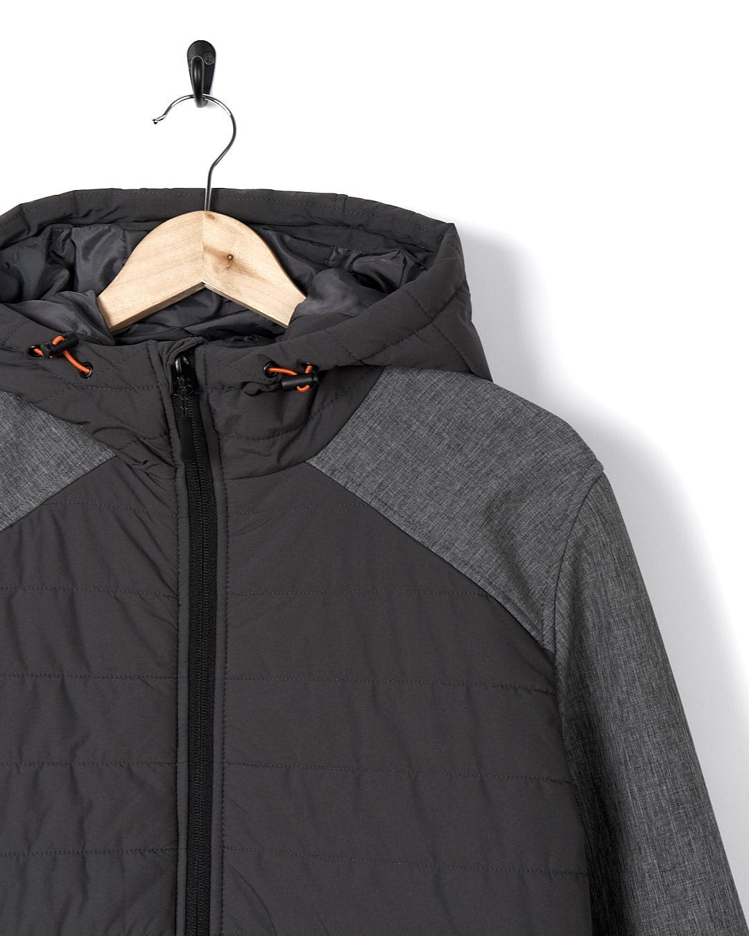 A Saltrock Purbeck Padded Jacket hanging on a hanger.