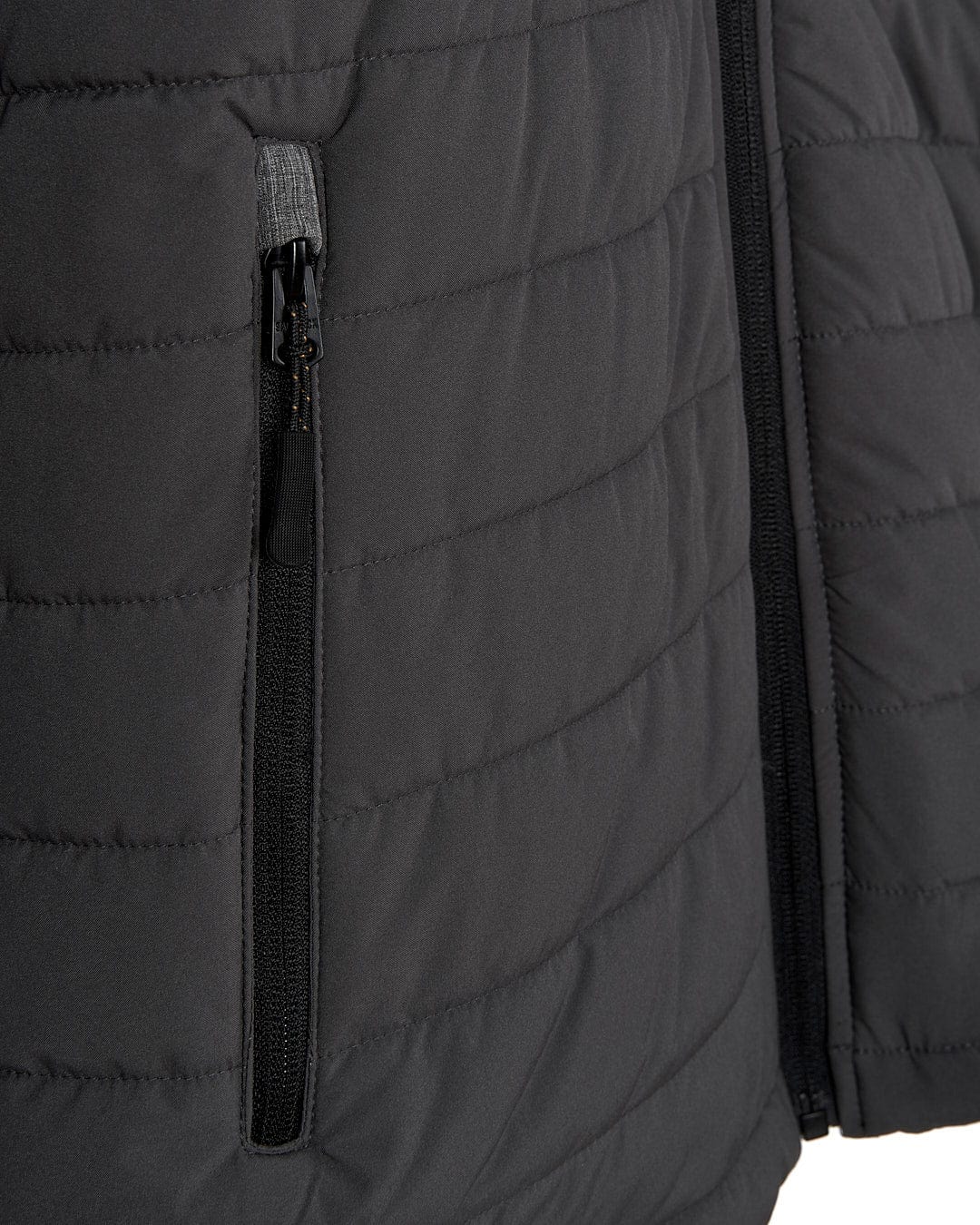 A Saltrock Purbeck Padded Jacket with zippered pockets.