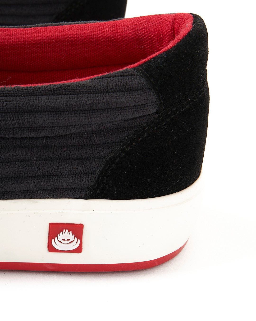 A Saltrock Rockslide - Slip On Shoe - Grey sneaker with a red sole.