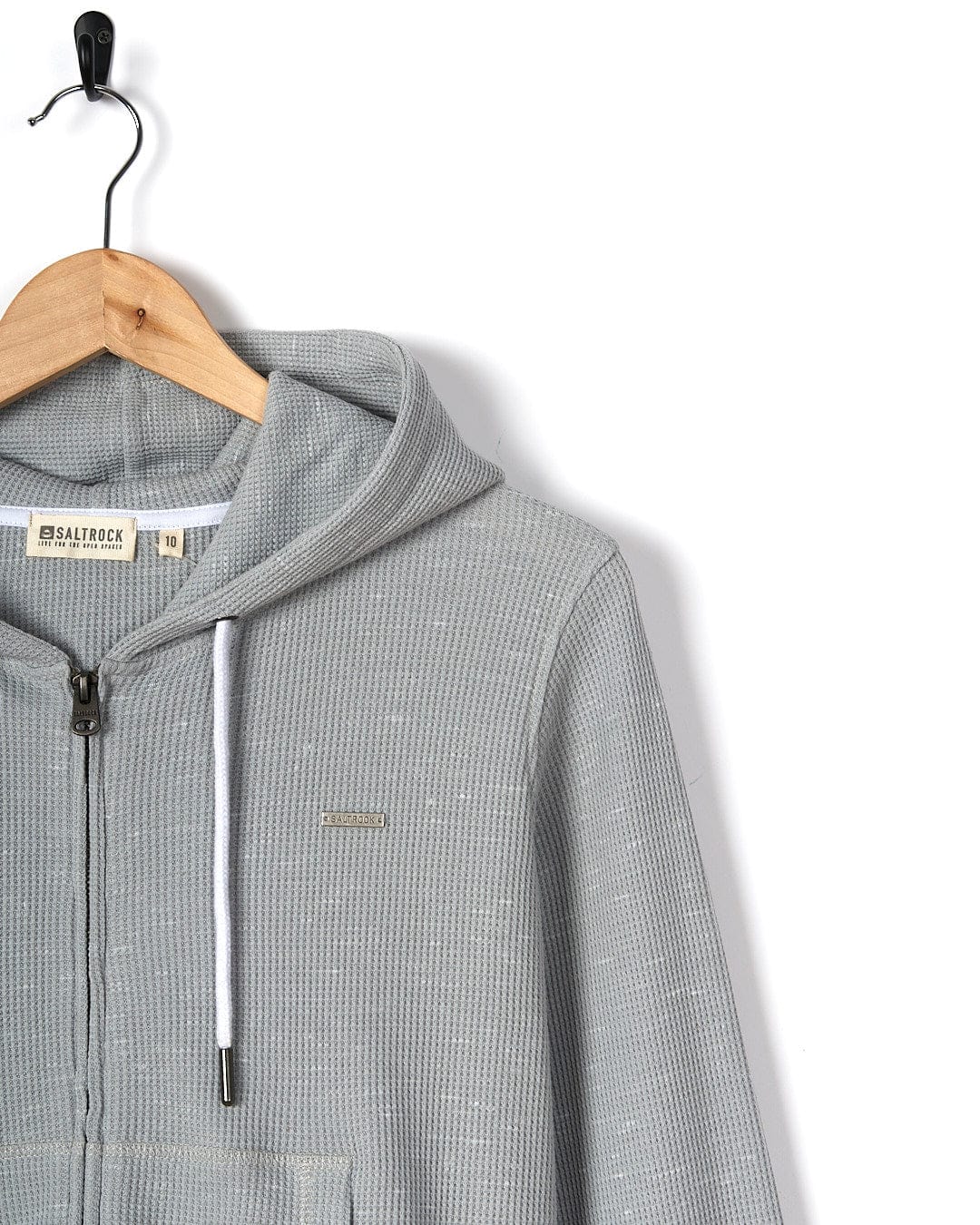 A Saltrock Rosalin - Womens Zip Hoodie - Light Grey hanging on a hanger.