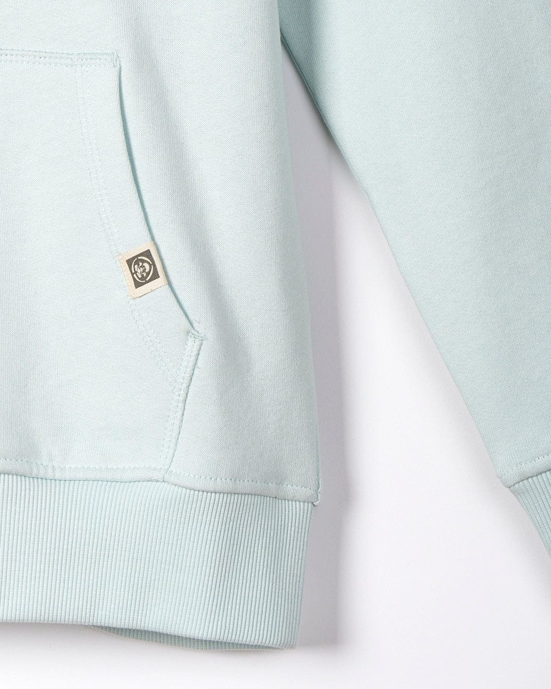 A close up of a Saltrock Seabed - Kids Pop Hoodie - Light Blue.