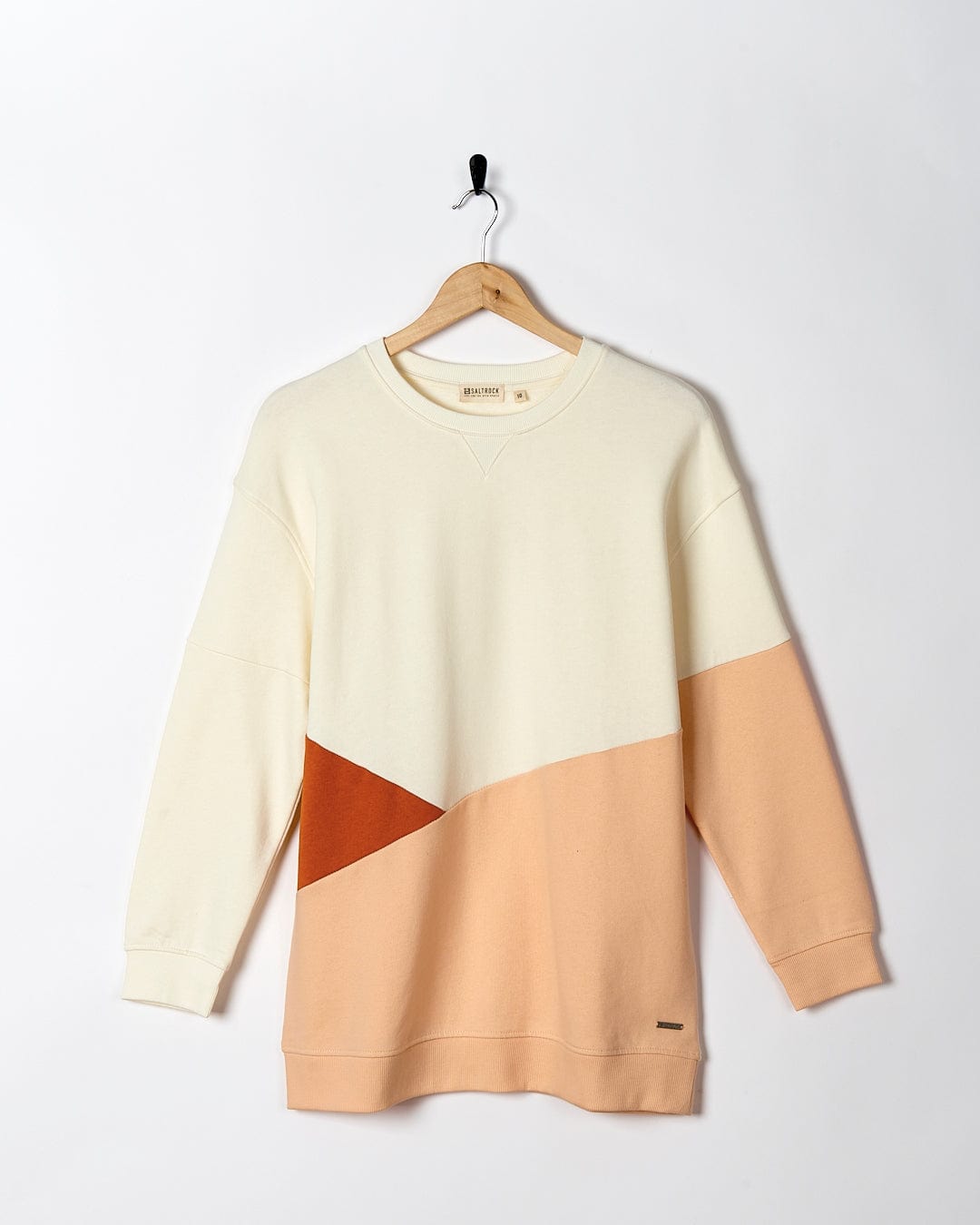 A Sofie - Womens Boyfriend Fit Sweat - Light Orange/Cream sweatshirt with an orange and beige color block by Saltrock.