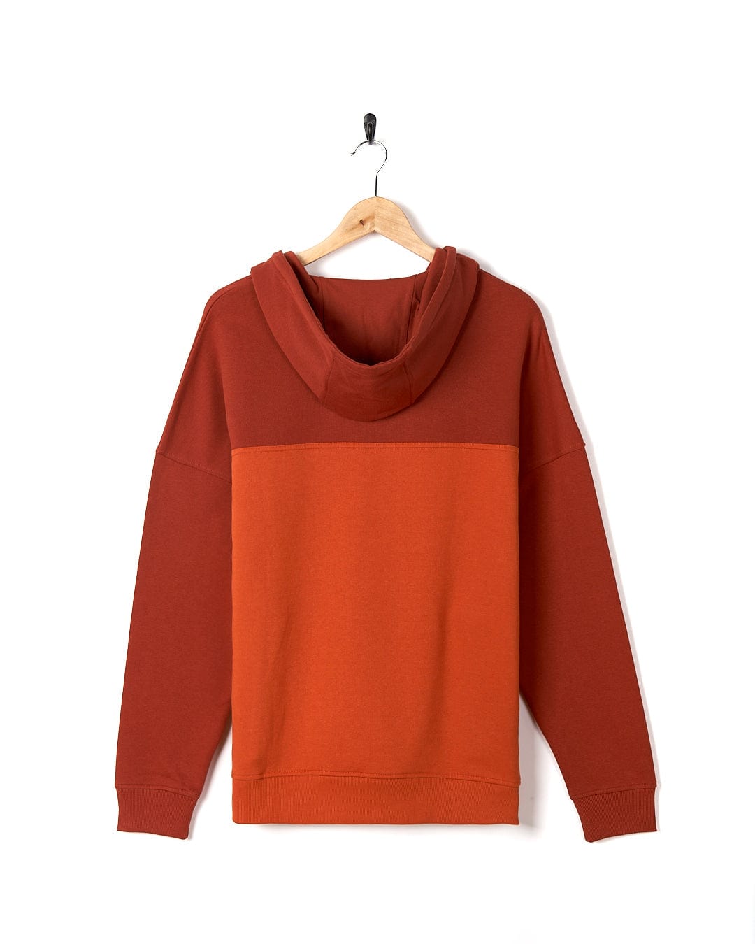 A Saltrock Speed Embroidery - Mens 1/4 Neck Zip - Red hooded sweatshirt hanging on a hanger.