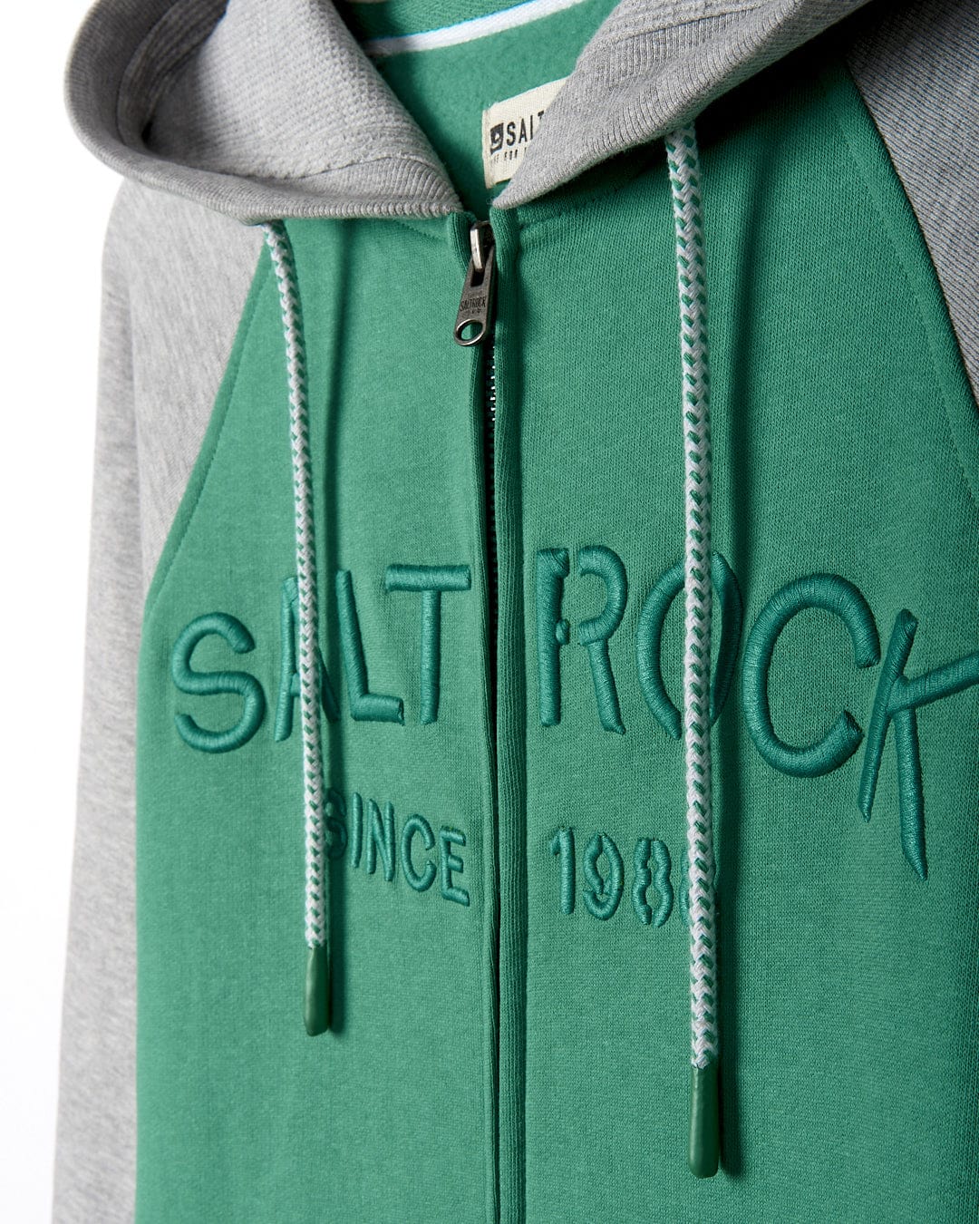 A Stencil - Mens Zip Hoodie - Green with the brand name Saltrock on it.