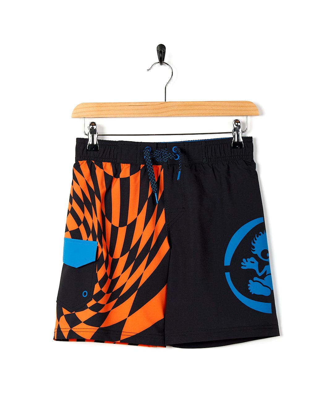 A pair of Warped Kids Boardshorts - Black from Saltrock on a swinger.